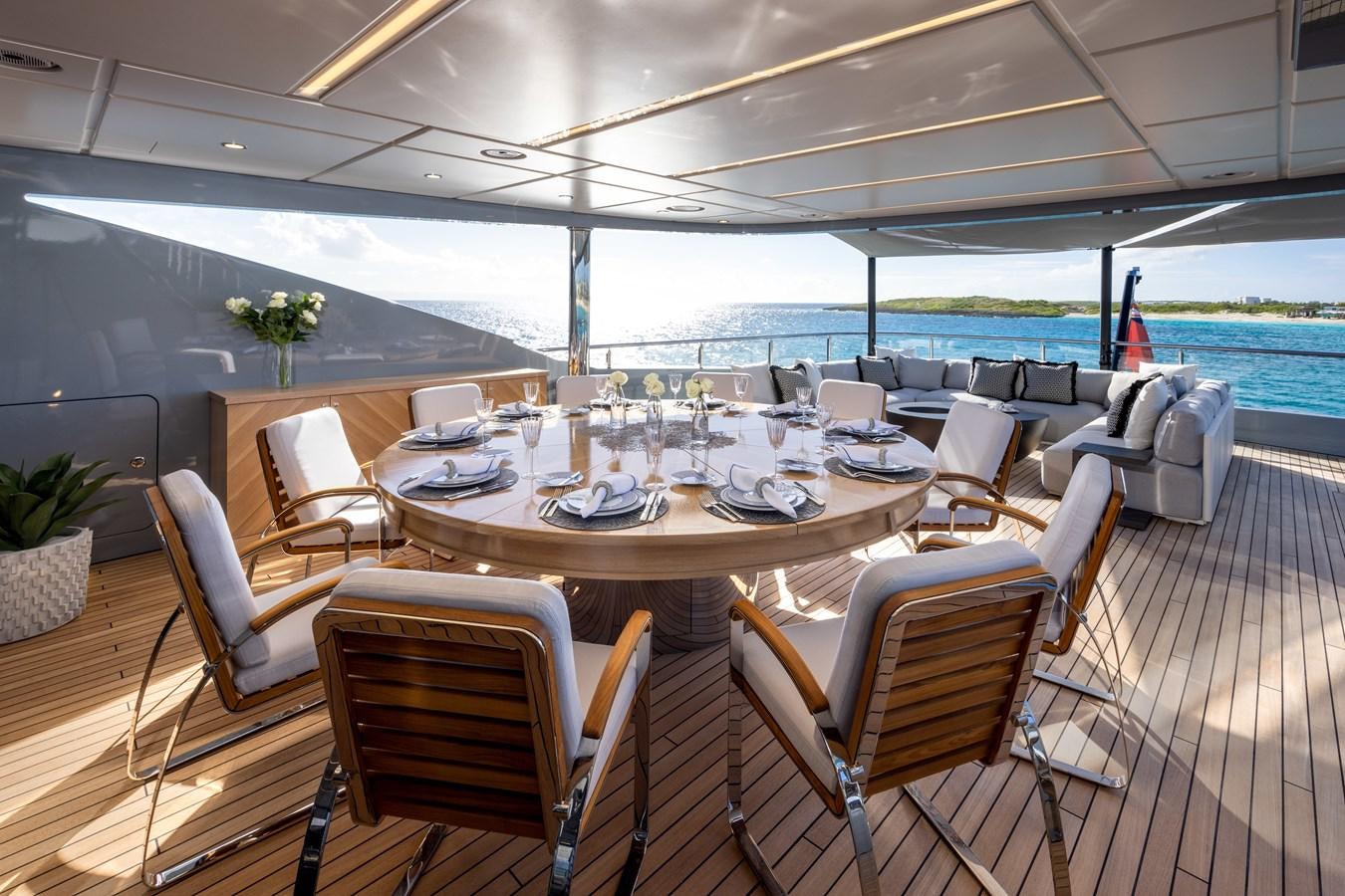 a large dining room with a large table and chairs aboard ANCORA Yacht for Sale