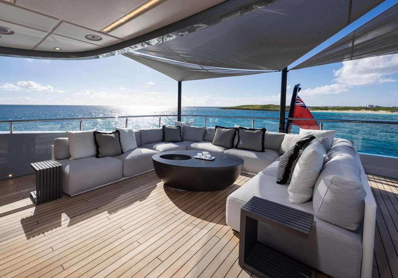 a living room with a large body of water aboard ANCORA Yacht for Sale