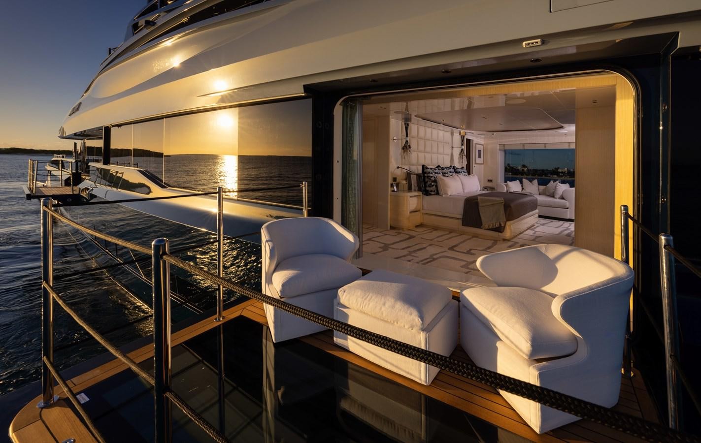 a room with a bed and a large white bed aboard ANCORA Yacht for Sale