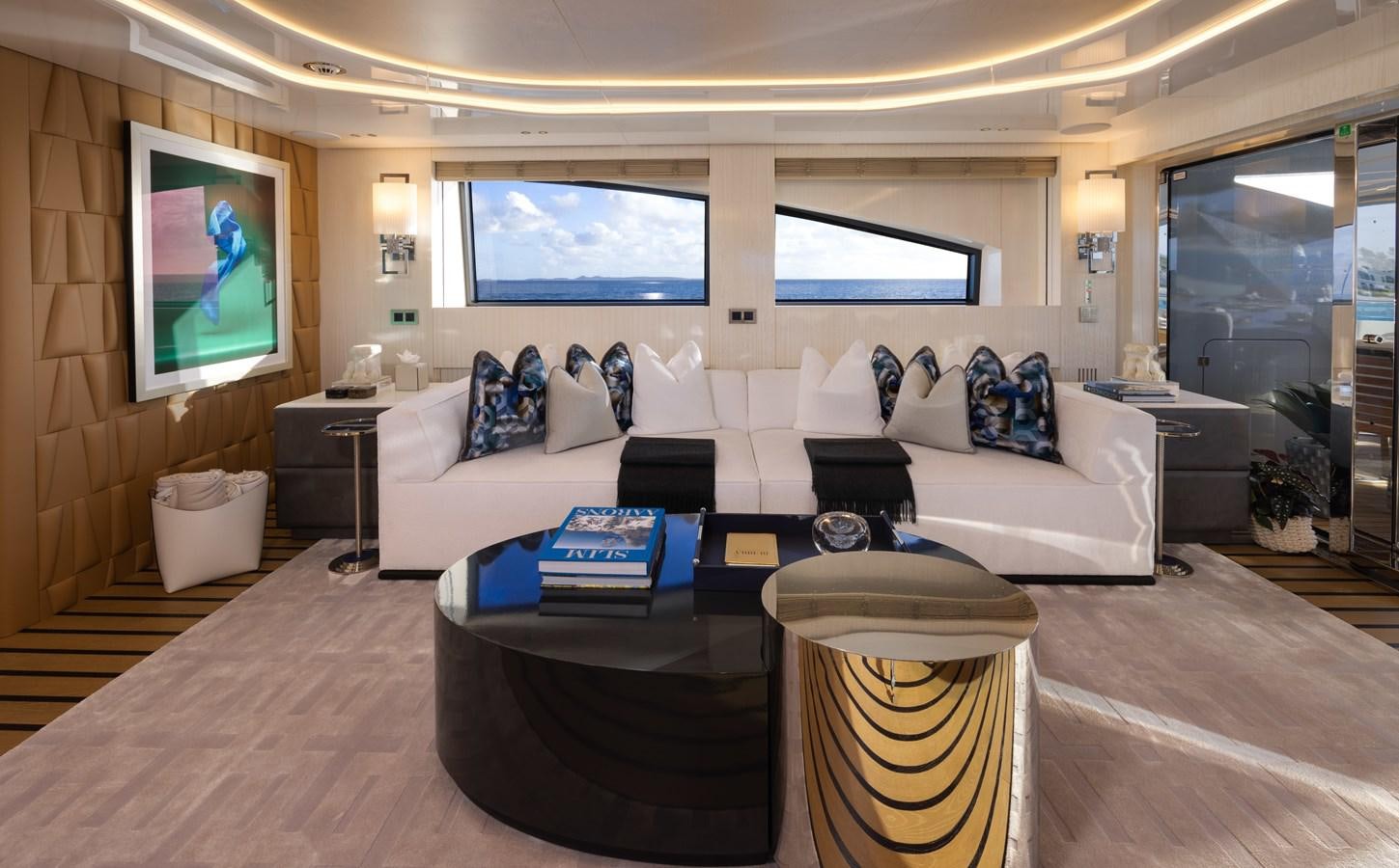 a living room with a large window aboard ANCORA Yacht for Sale