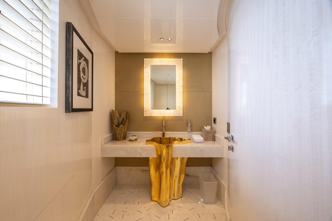 a bathroom with a sink and a mirror aboard ANCORA Yacht for Sale