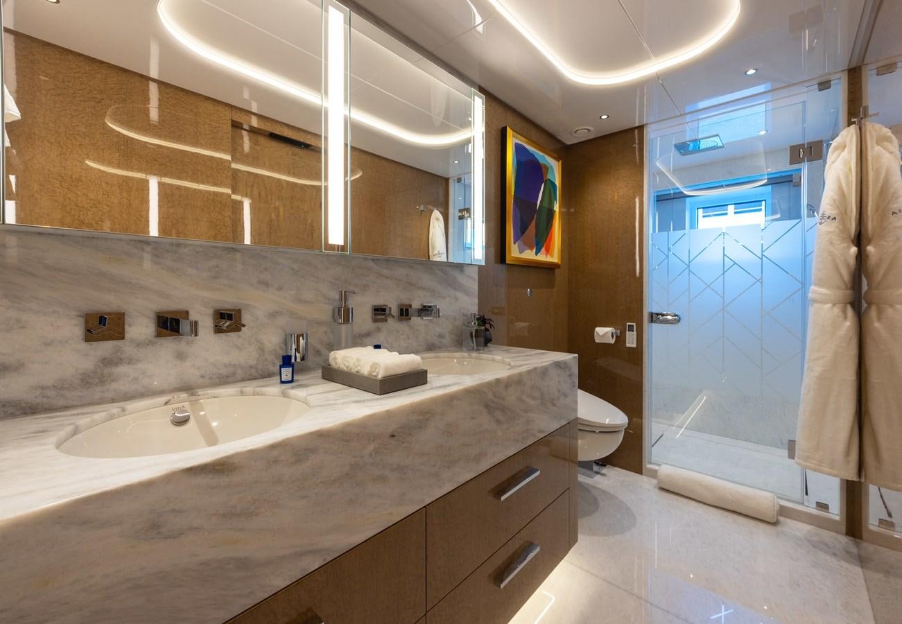a bathroom with a large countertop aboard ANCORA Yacht for Sale