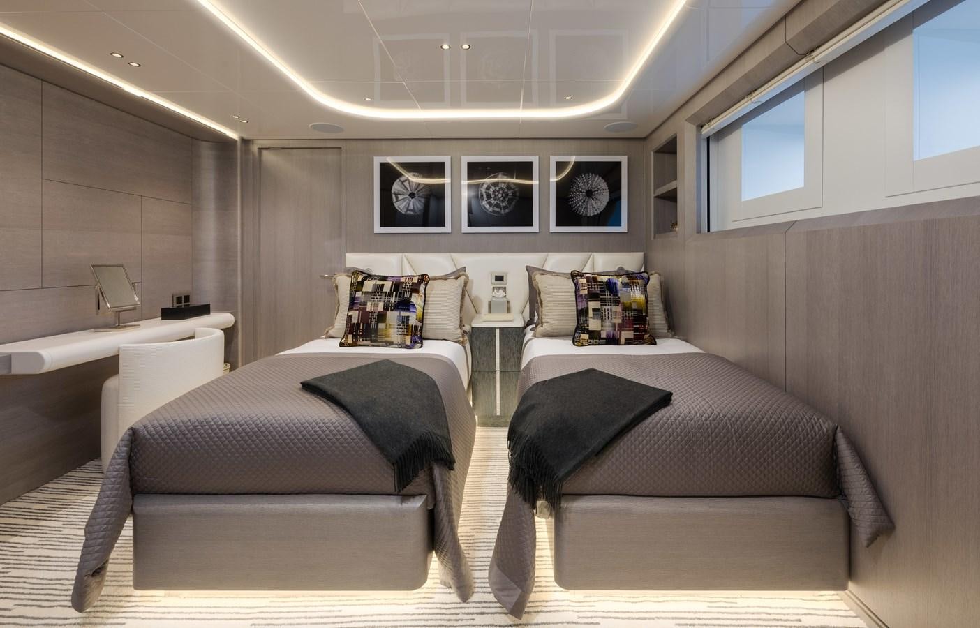 a room with two beds aboard ANCORA Yacht for Sale