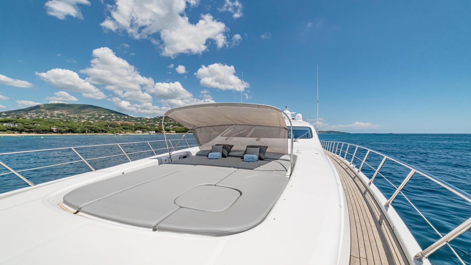 a boat on the water aboard COSMOS Yacht for Sale