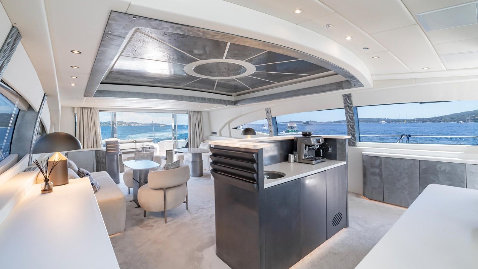a large kitchen with a large window aboard COSMOS Yacht for Sale