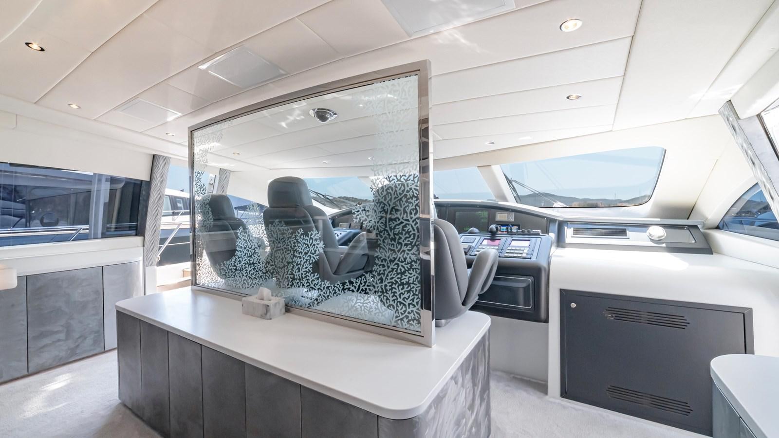 inside of a car aboard COSMOS Yacht for Sale