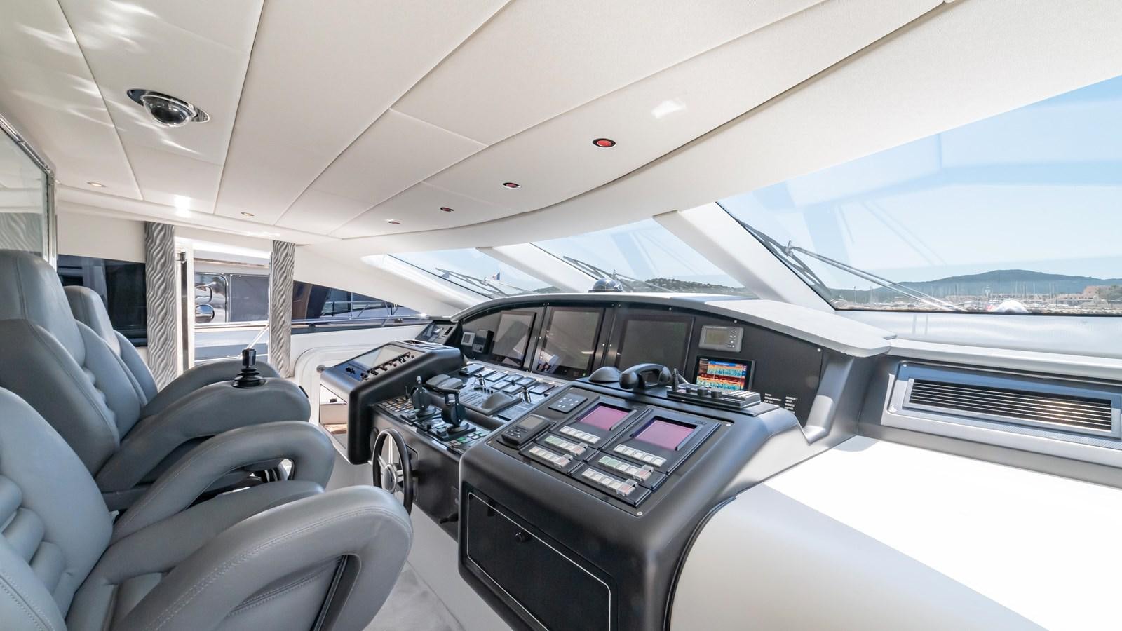 inside of a car aboard COSMOS Yacht for Sale