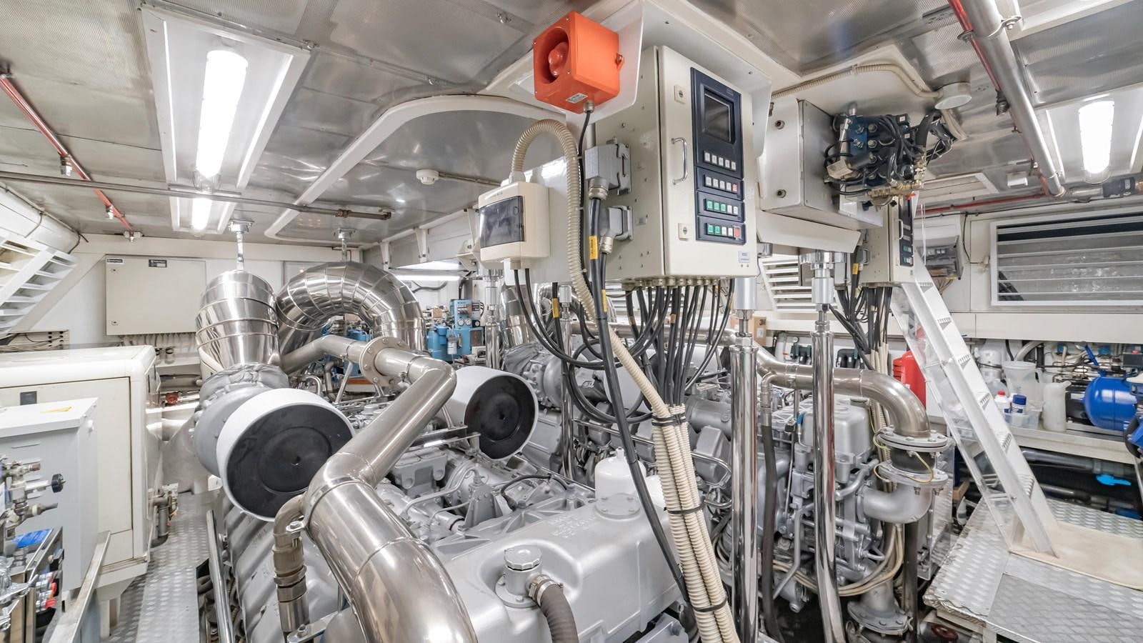 a room with pipes and equipment aboard COSMOS Yacht for Sale