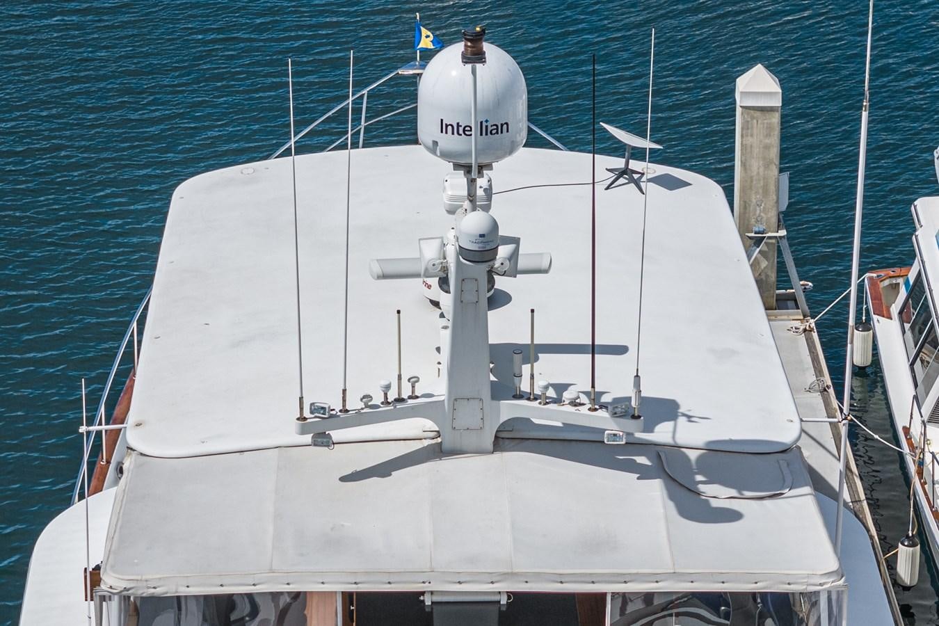 a white boat with a white label aboard NIRVANA Yacht for Sale