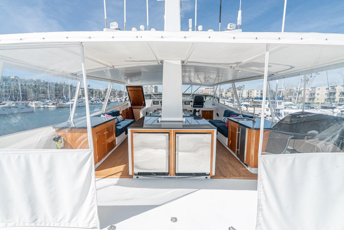 a room with a table and chairs aboard NIRVANA Yacht for Sale