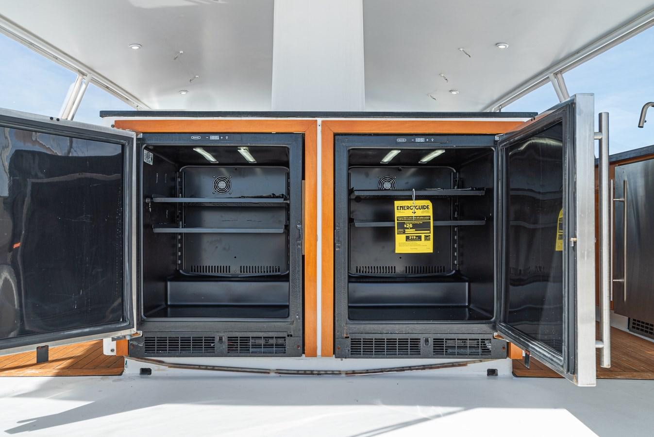 a large black and orange machine aboard NIRVANA Yacht for Sale