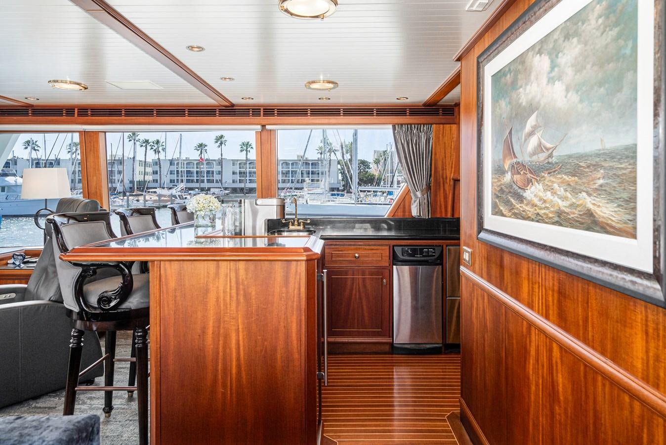 a kitchen with a large window aboard NIRVANA Yacht for Sale