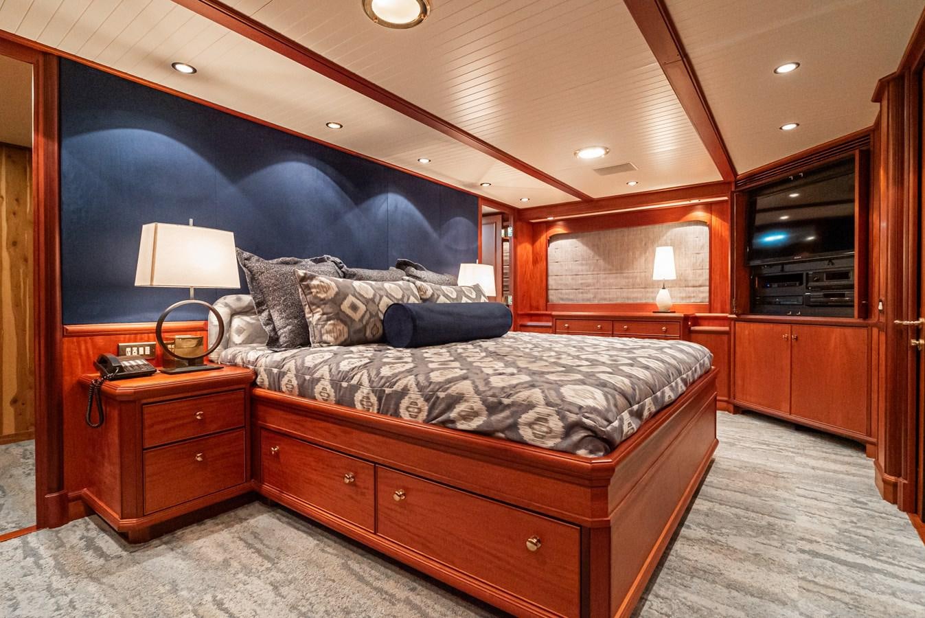 a bed in a room aboard NIRVANA Yacht for Sale