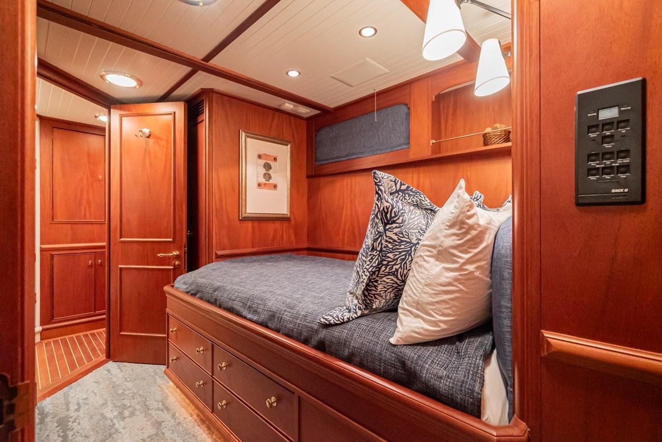 a couch in a room aboard NIRVANA Yacht for Sale