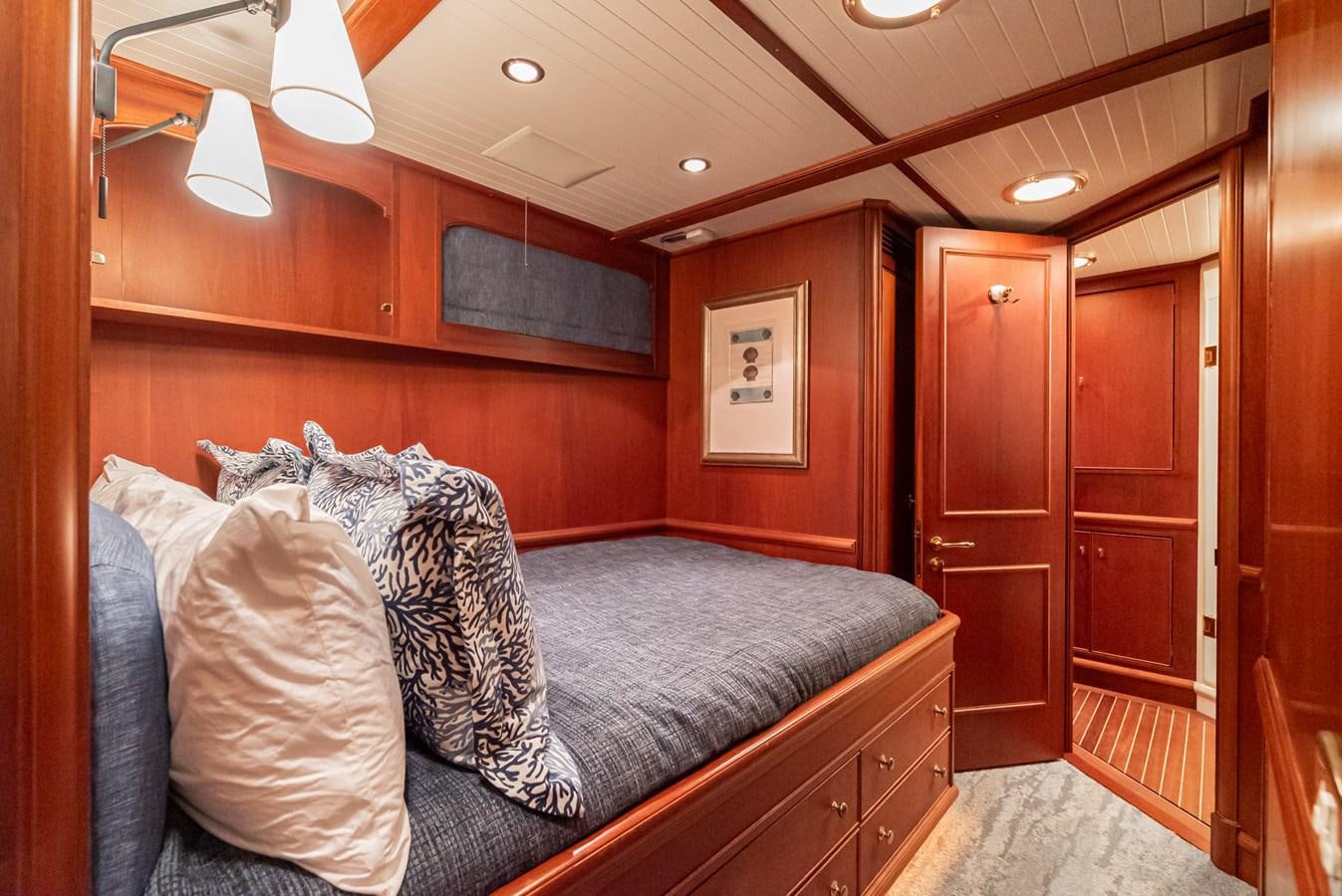 a bed in a room aboard NIRVANA Yacht for Sale