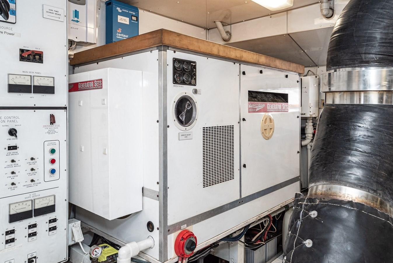 a white machine with a wooden handle aboard NIRVANA Yacht for Sale