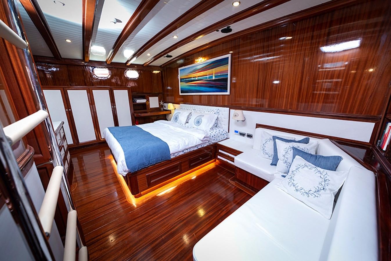 a room with a couple beds aboard QUEEN OF DATCA Yacht for Sale