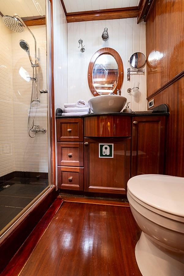 a bathroom with a sink and toilet aboard QUEEN OF DATCA Yacht for Sale