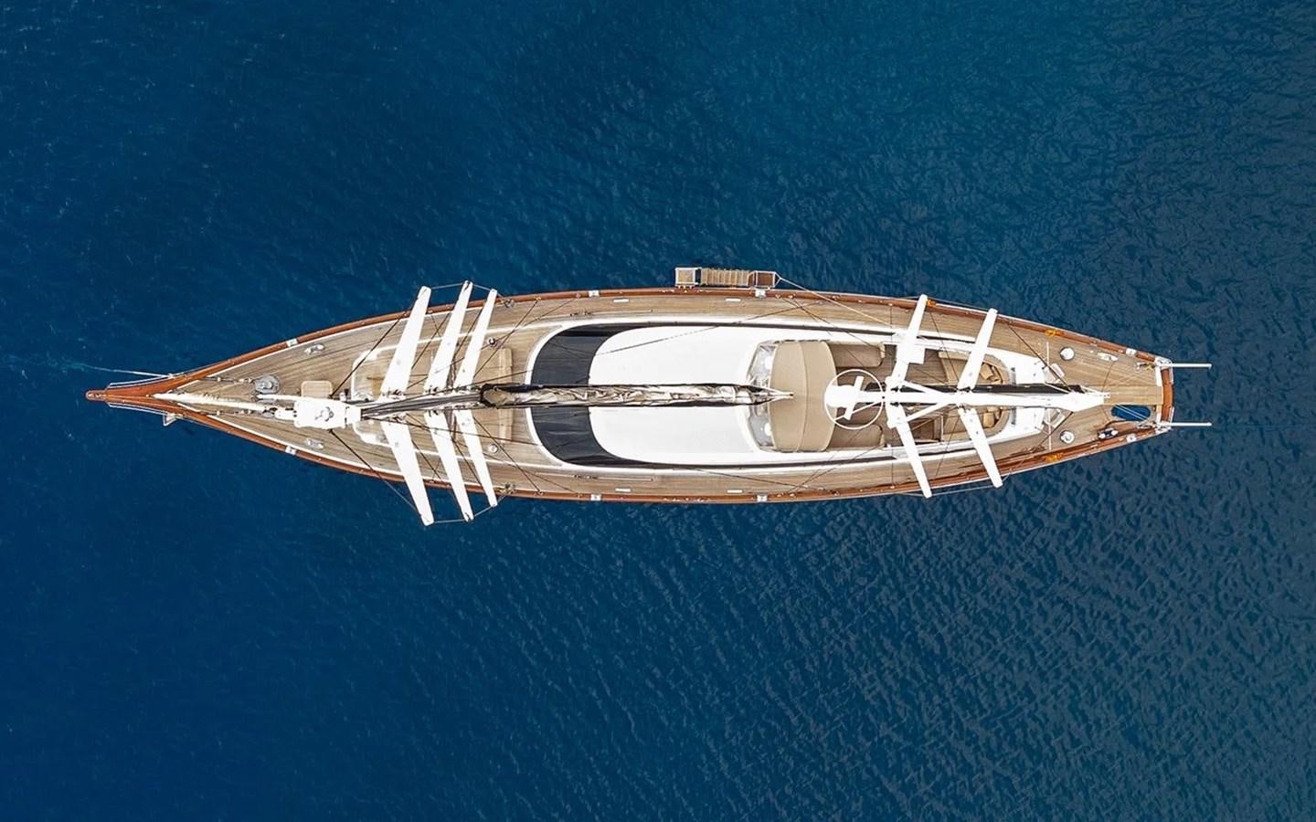 a white ship in the water aboard CUSTOM MOTORSAILOR Yacht for Sale