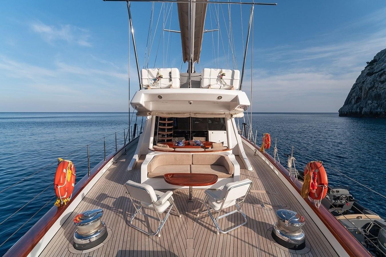 a boat on the water aboard CUSTOM MOTORSAILOR Yacht for Sale