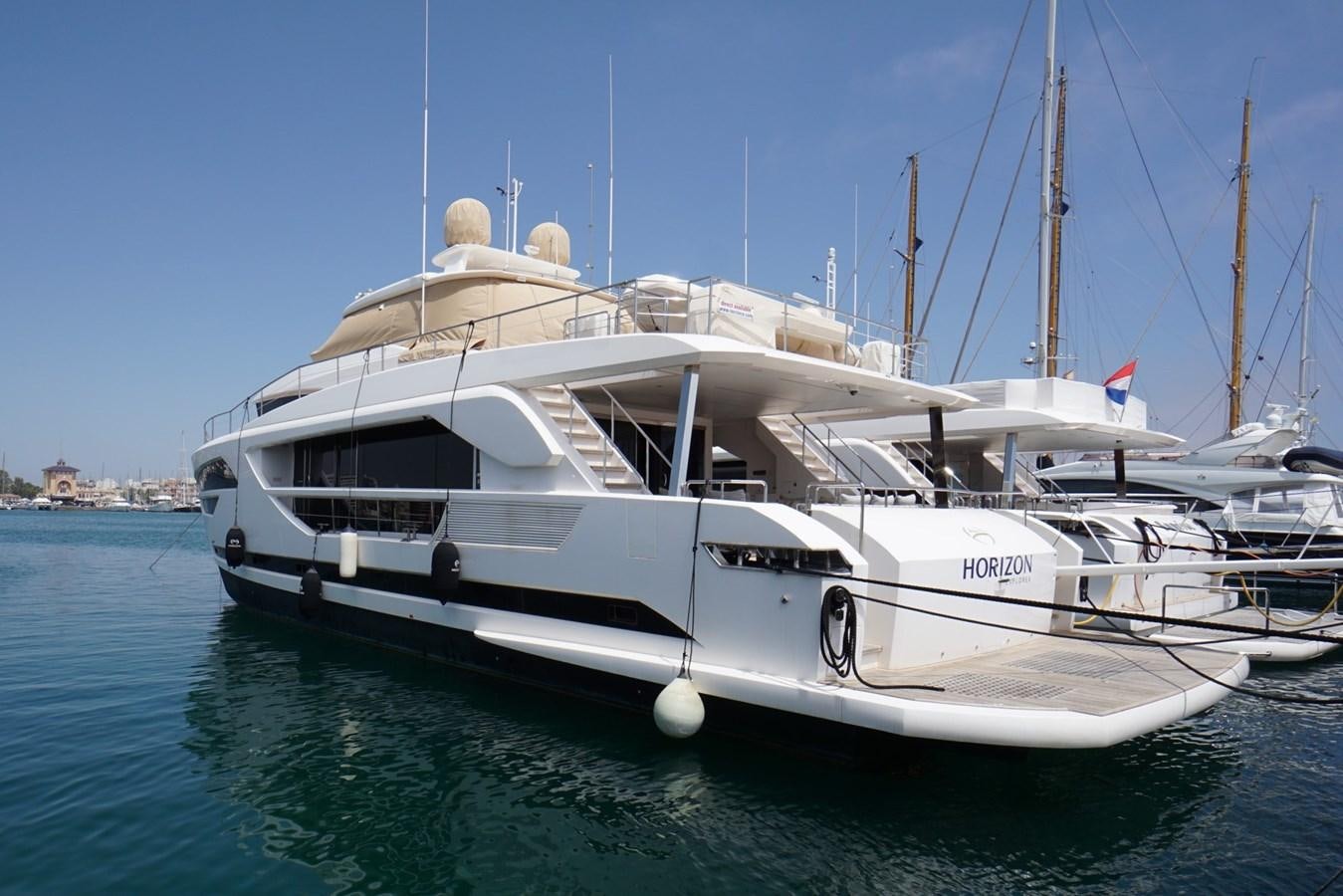 a white boat in the water aboard HORIZON Yacht for Sale