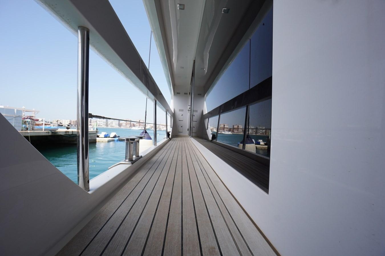 a wooden walkway over water aboard HORIZON Yacht for Sale
