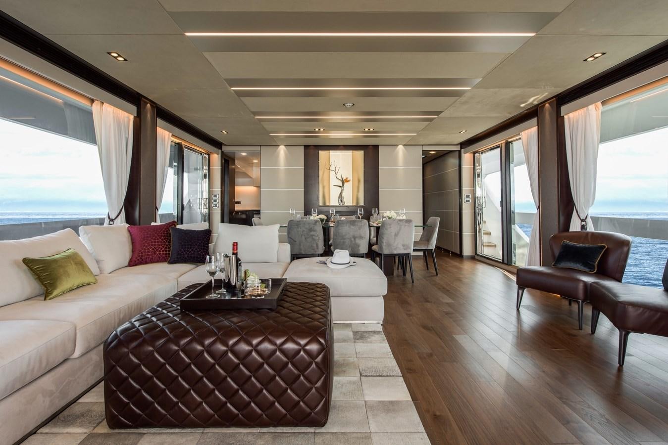 a living room with a large window aboard HORIZON Yacht for Sale