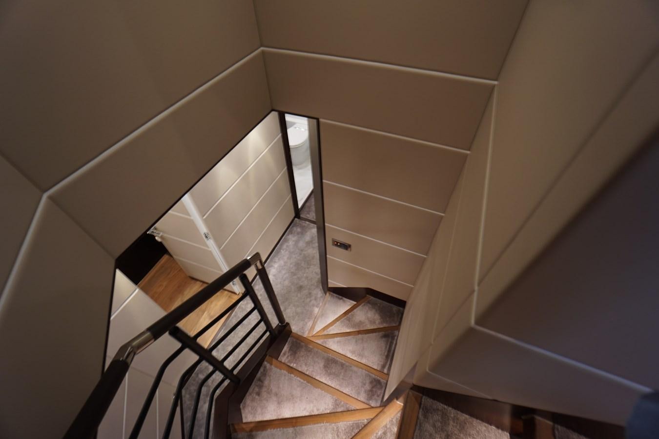 a staircase with a railing aboard HORIZON Yacht for Sale