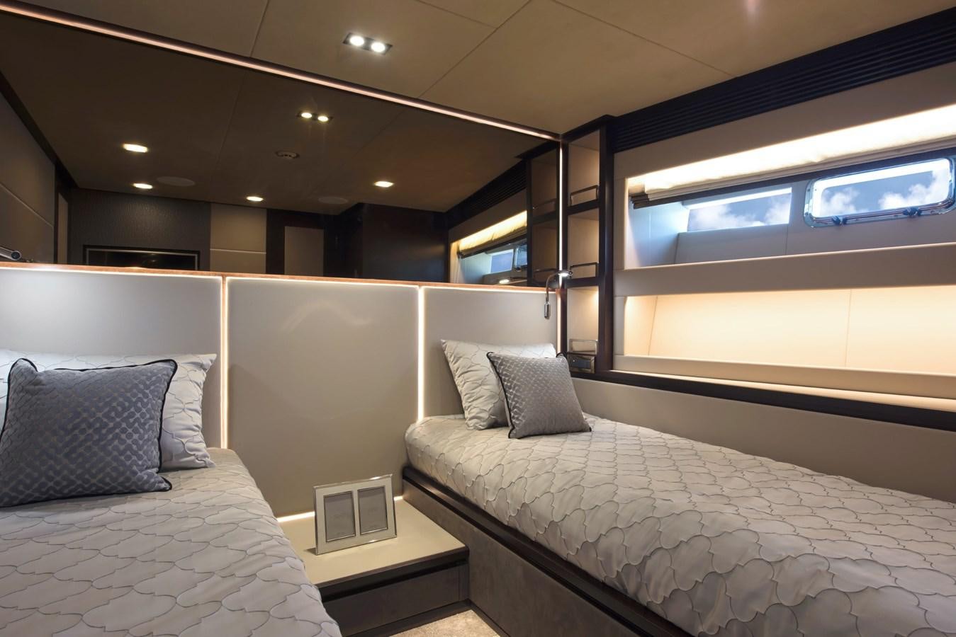 a room with two beds aboard HORIZON Yacht for Sale