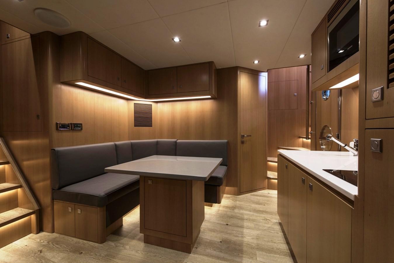 a bathroom with a countertop sink and a bathtub aboard HORIZON Yacht for Sale