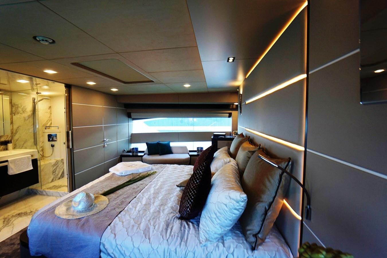 a bed in a room aboard HORIZON Yacht for Sale