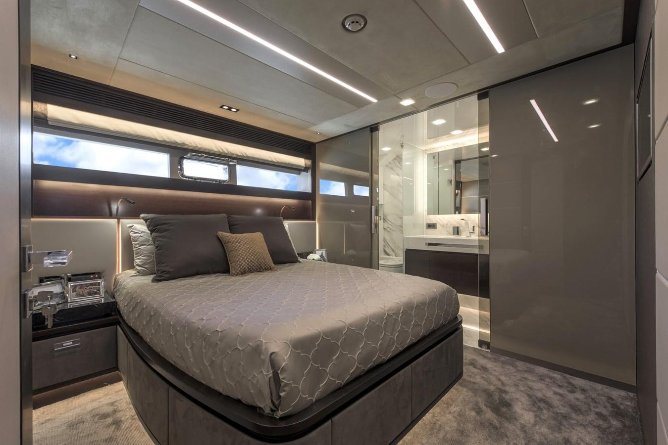 a bed in a room aboard HORIZON Yacht for Sale