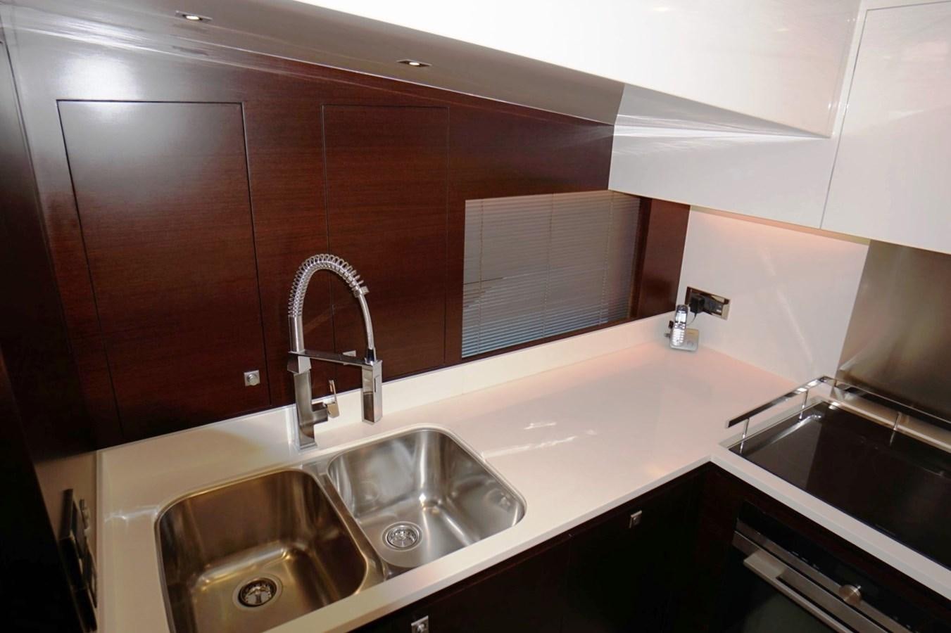 a bathroom with sinks and mirrors aboard HORIZON Yacht for Sale