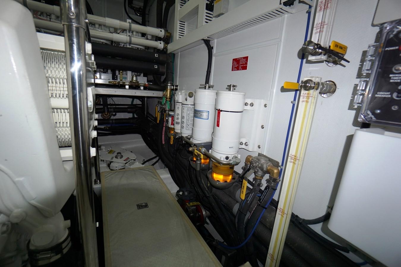 a room with machinery aboard HORIZON Yacht for Sale