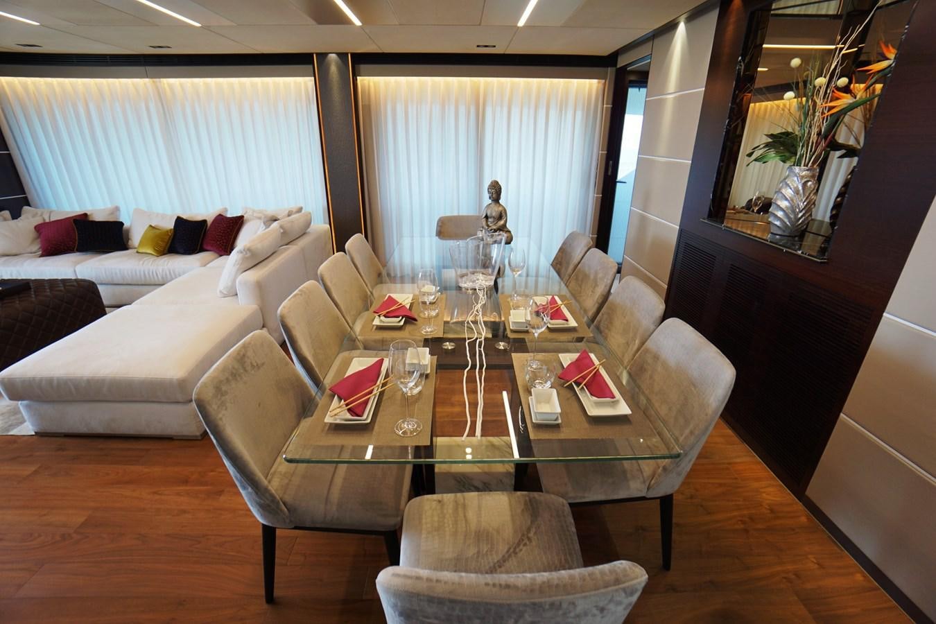 a living room with a large window aboard HORIZON Yacht for Sale
