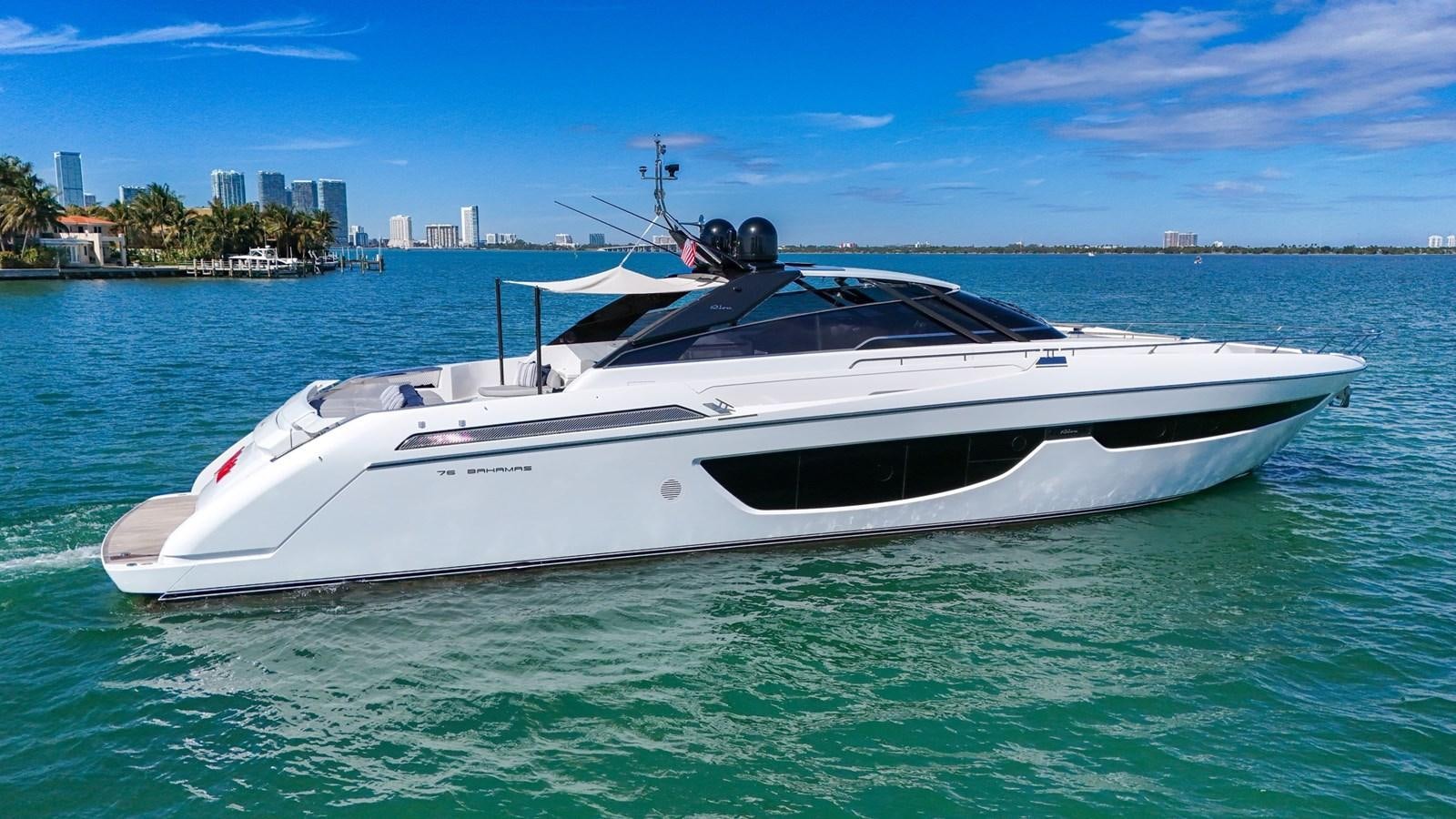 a white yacht in the water aboard RIVA 76' BAHAMAS Yacht for Sale