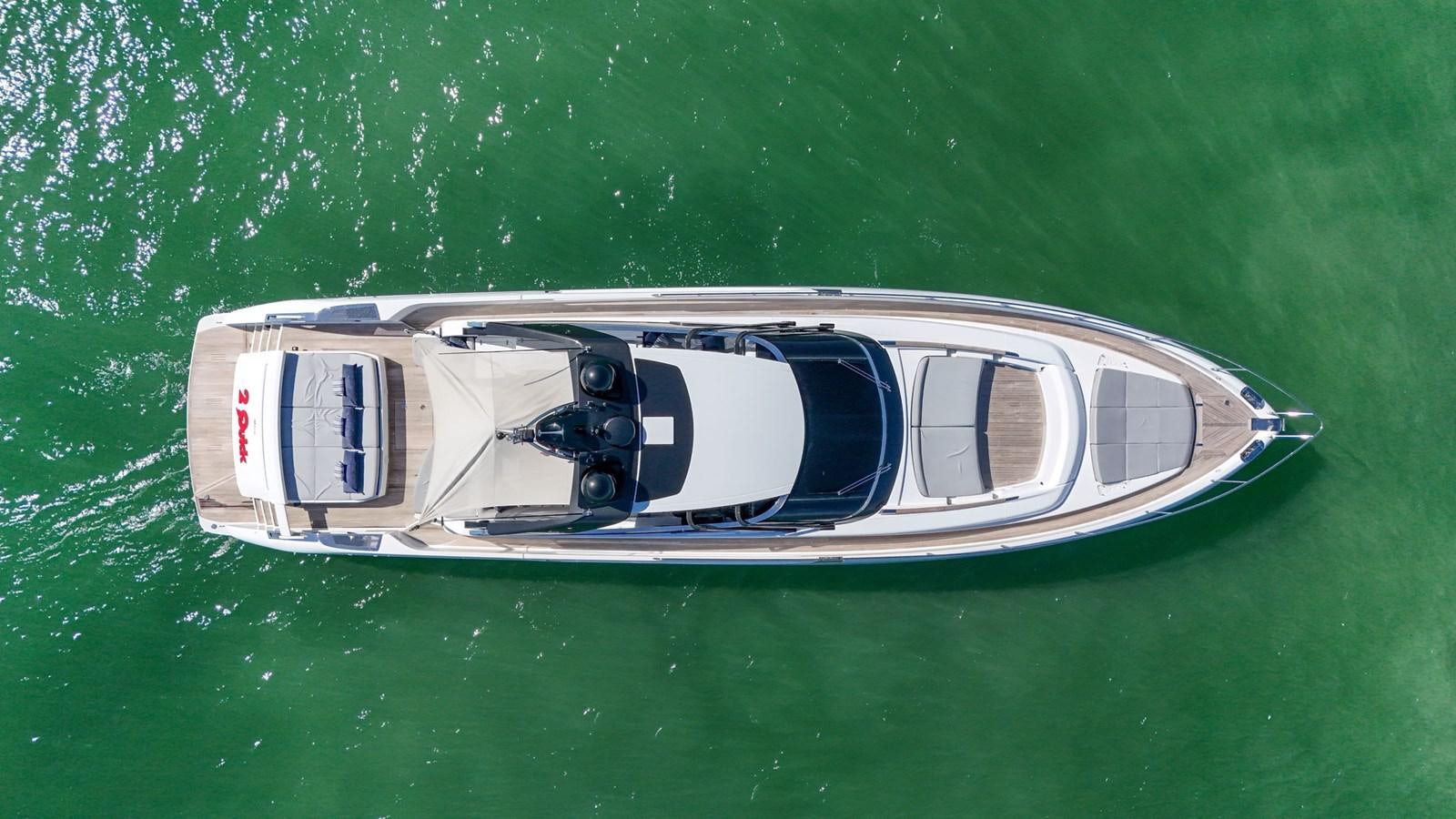 a car on a grass field aboard RIVA 76' BAHAMAS Yacht for Sale