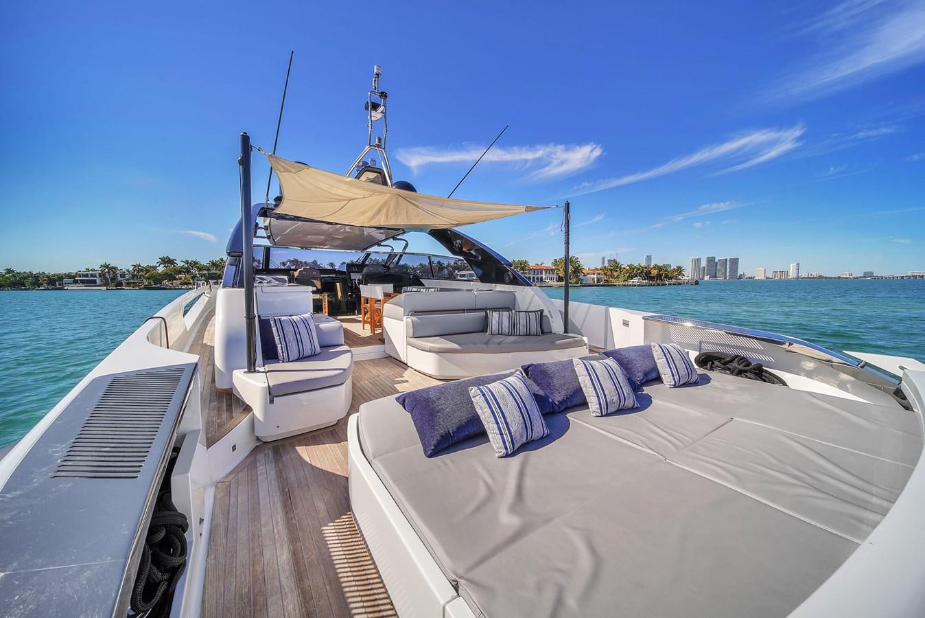 a boat docked at a pier aboard RIVA 76' BAHAMAS Yacht for Sale