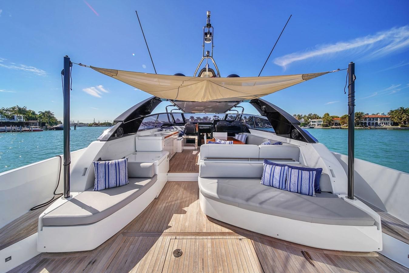 a boat on a dock aboard RIVA 76' BAHAMAS Yacht for Sale