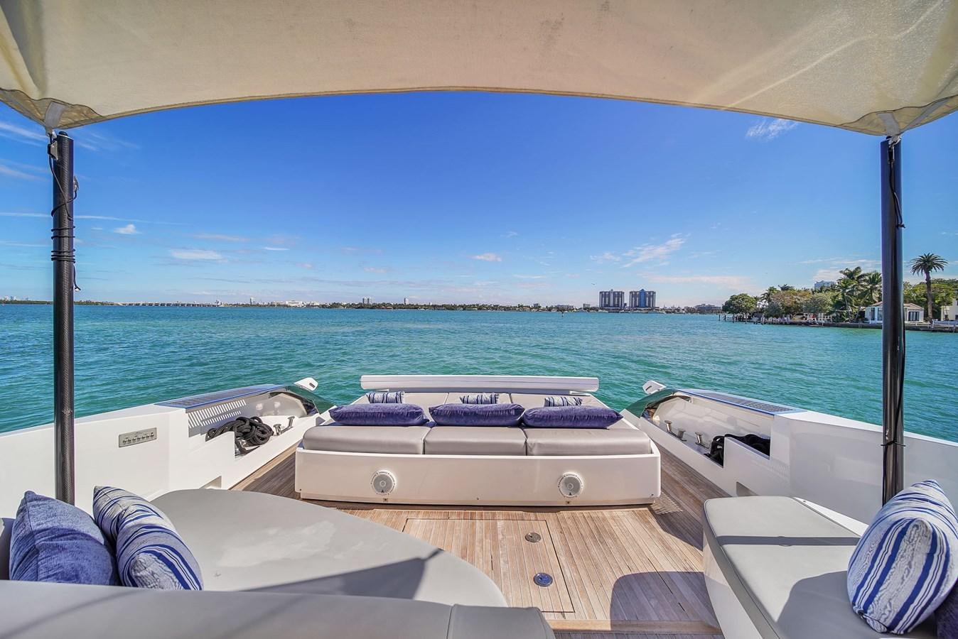 a deck with a pool and a view of the water aboard RIVA 76' BAHAMAS Yacht for Sale