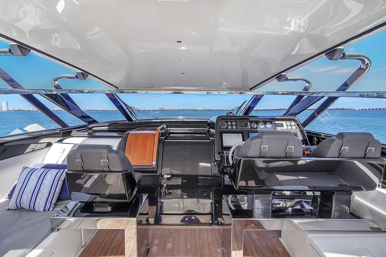 inside of a car aboard RIVA 76' BAHAMAS Yacht for Sale