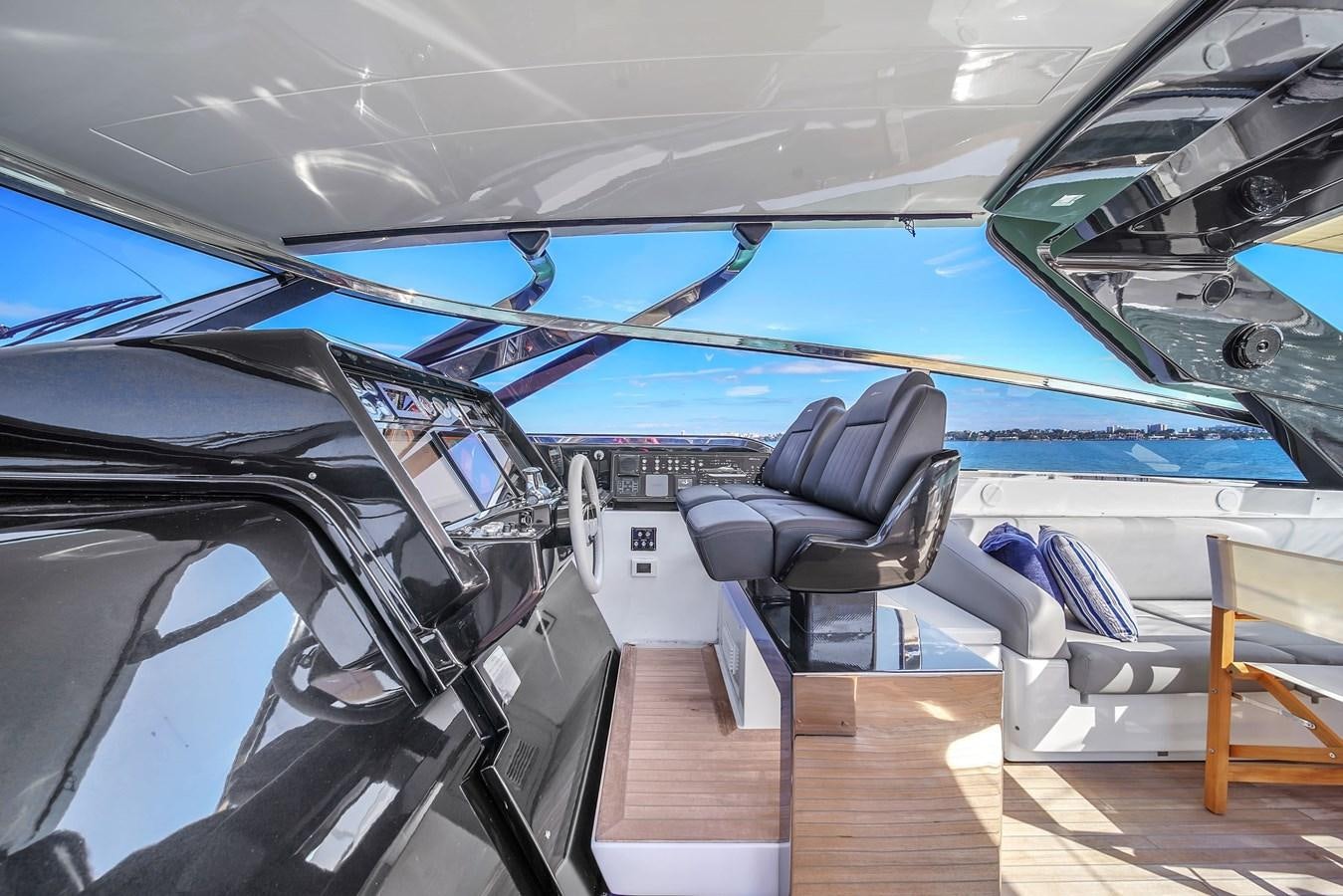 inside of a car aboard RIVA 76' BAHAMAS Yacht for Sale