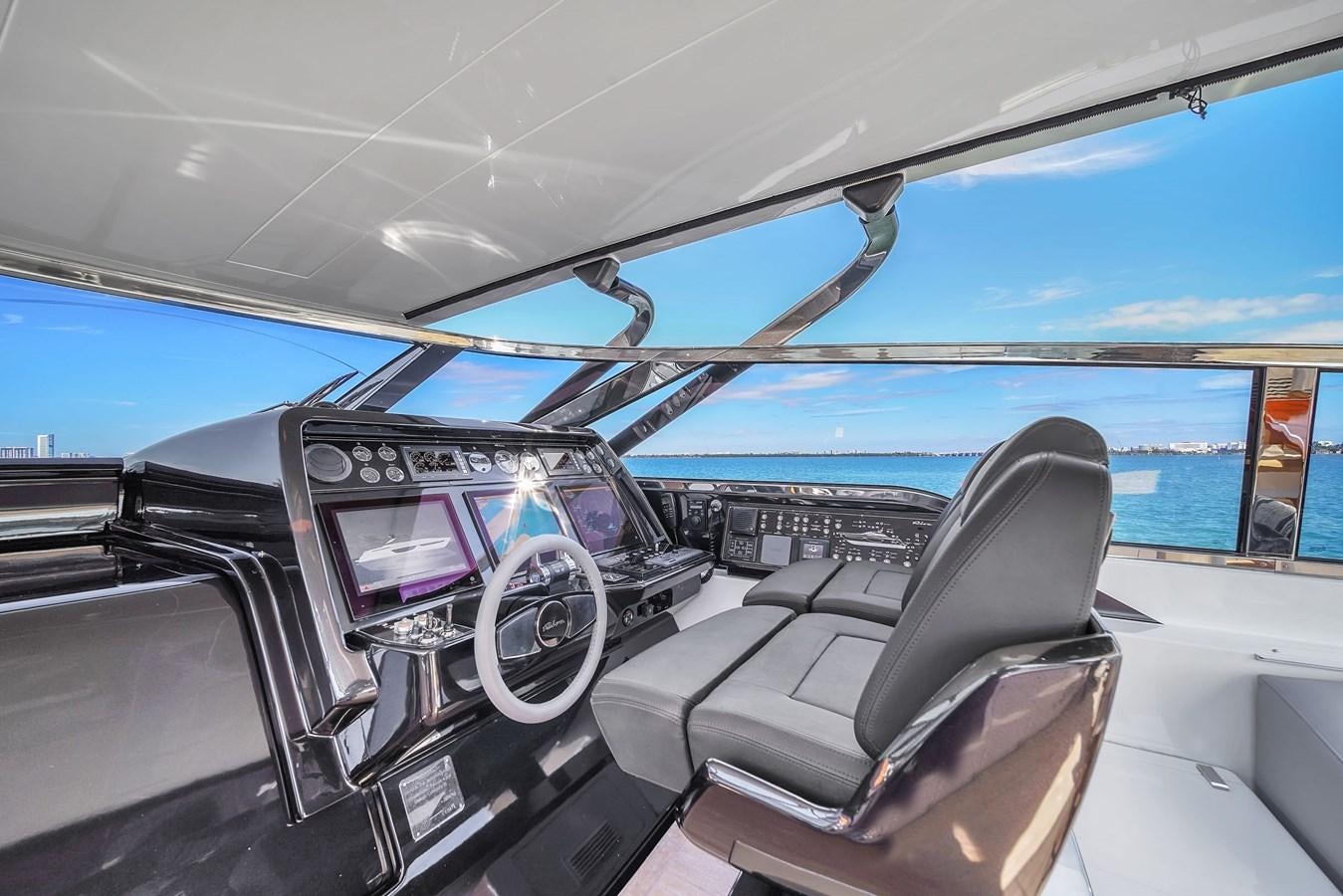 inside of a car aboard RIVA 76' BAHAMAS Yacht for Sale
