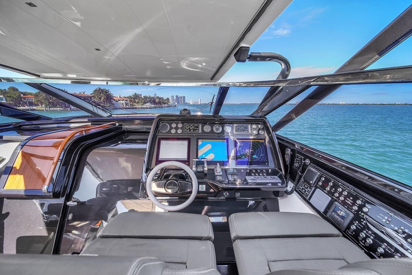 inside of a car aboard RIVA 76' BAHAMAS Yacht for Sale