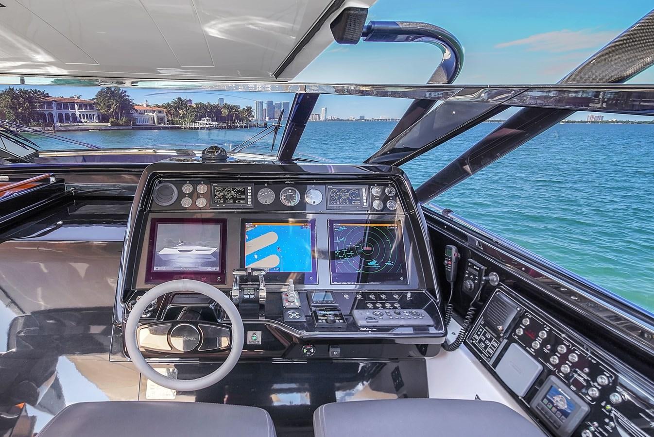 inside of a car aboard RIVA 76' BAHAMAS Yacht for Sale