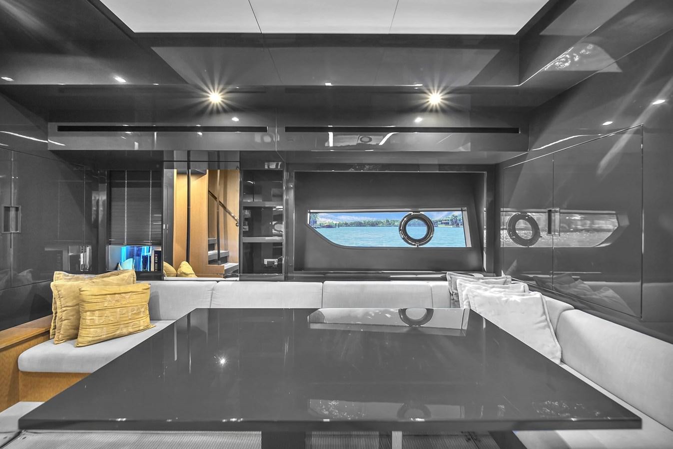 a room with a large screen aboard RIVA 76' BAHAMAS Yacht for Sale