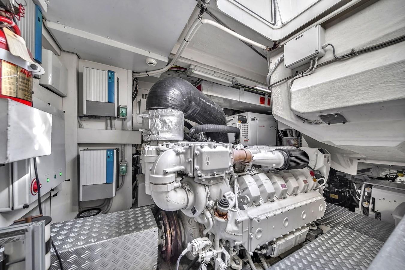 a machine in a room aboard RIVA 76' BAHAMAS Yacht for Sale