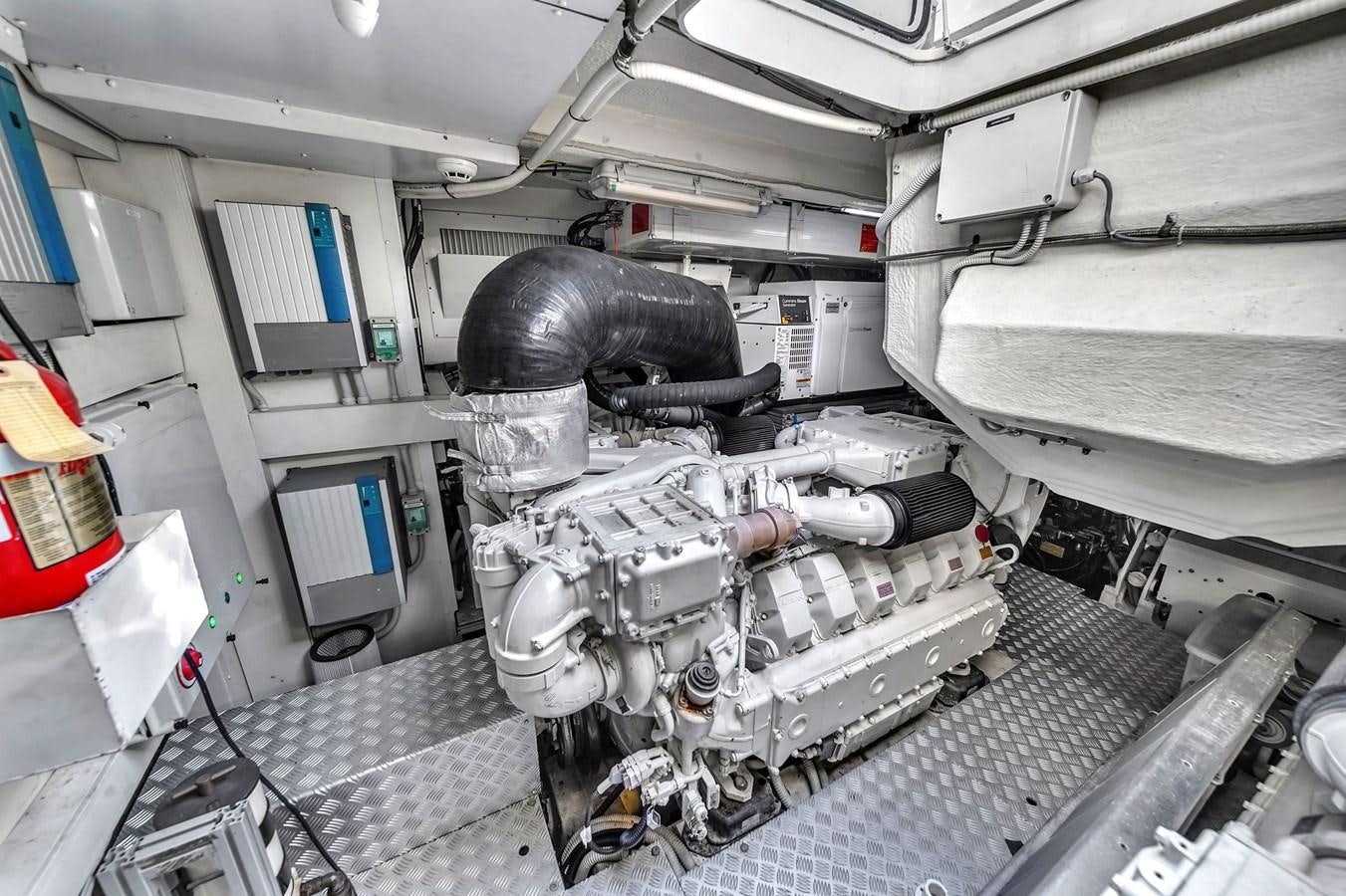 a car in a garage aboard RIVA 76' BAHAMAS Yacht for Sale