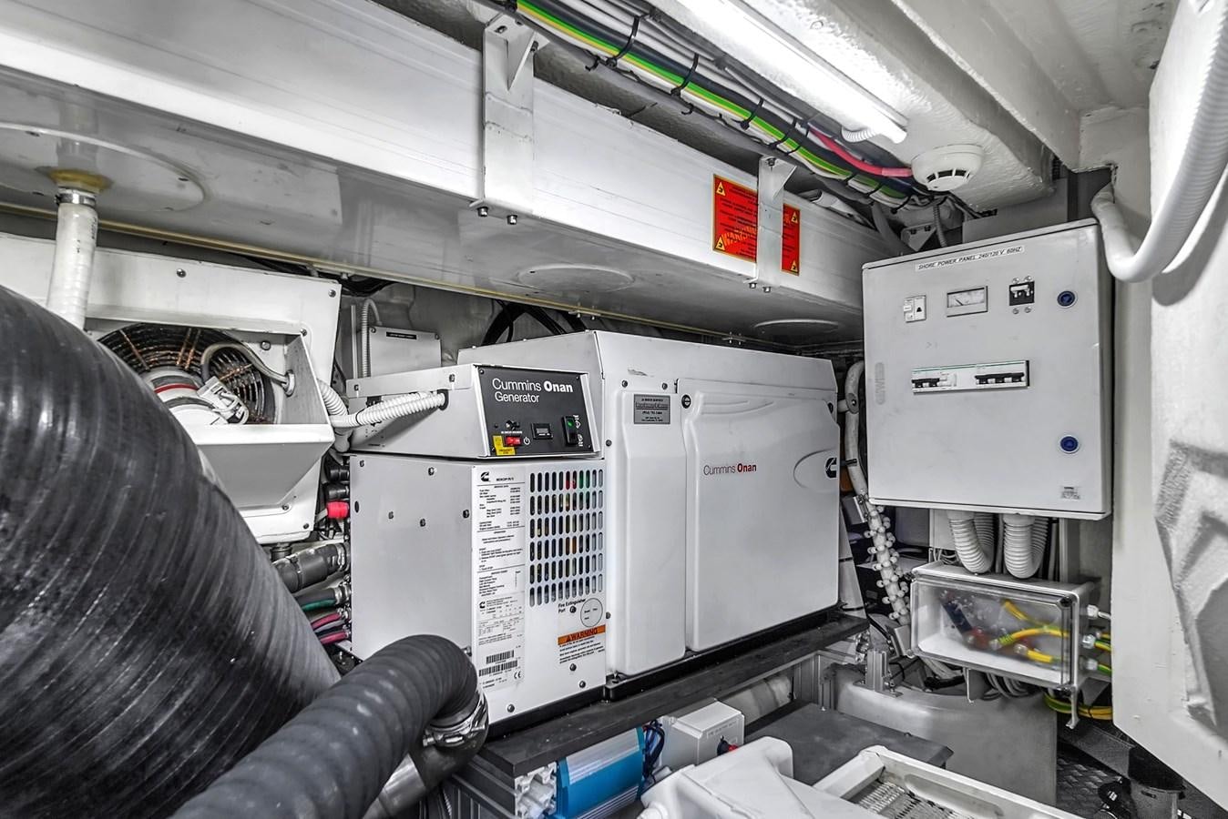 a person working in a factory aboard RIVA 76' BAHAMAS Yacht for Sale