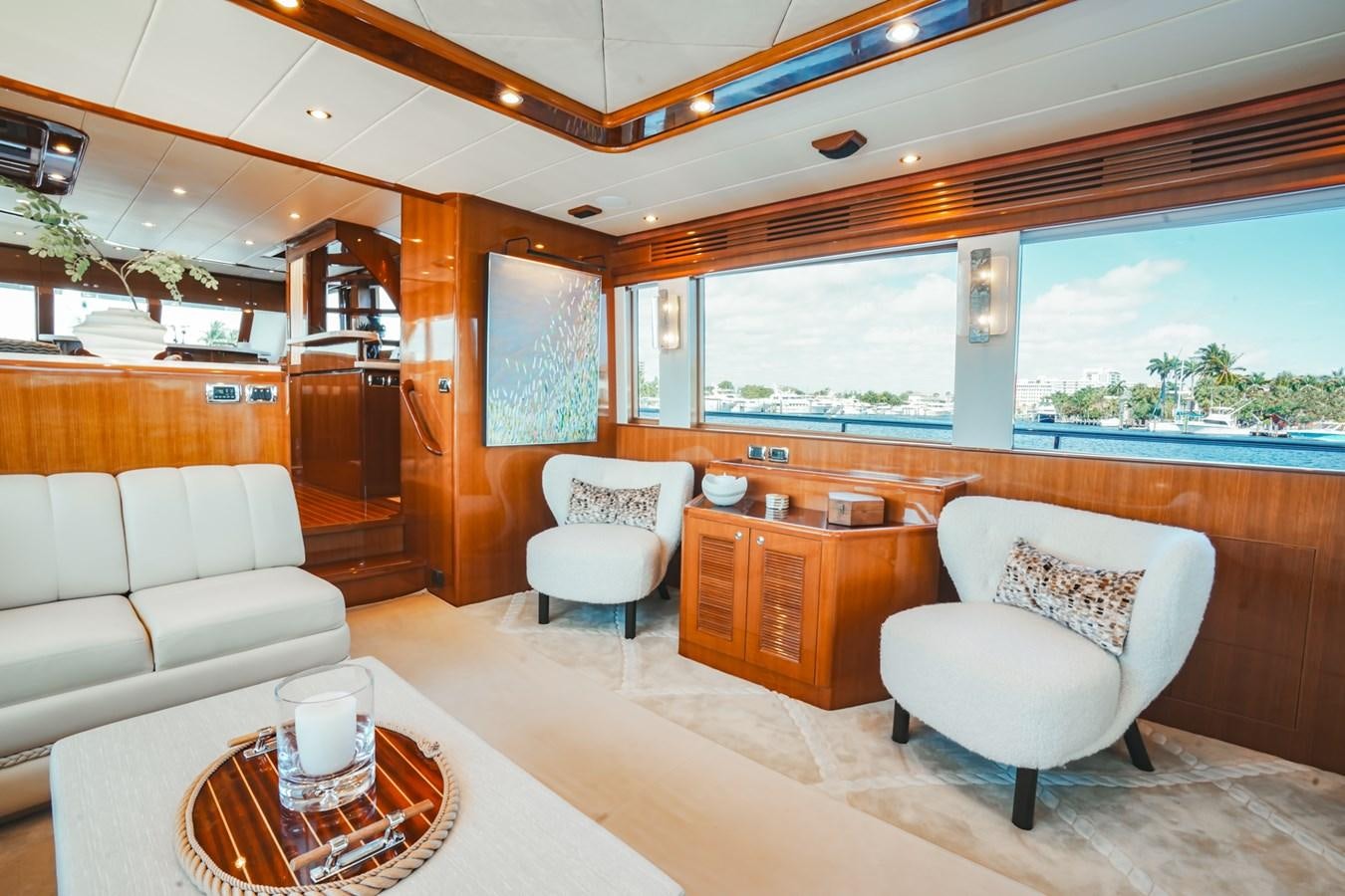 a living room with a large window aboard VIAGGIO Yacht for Sale